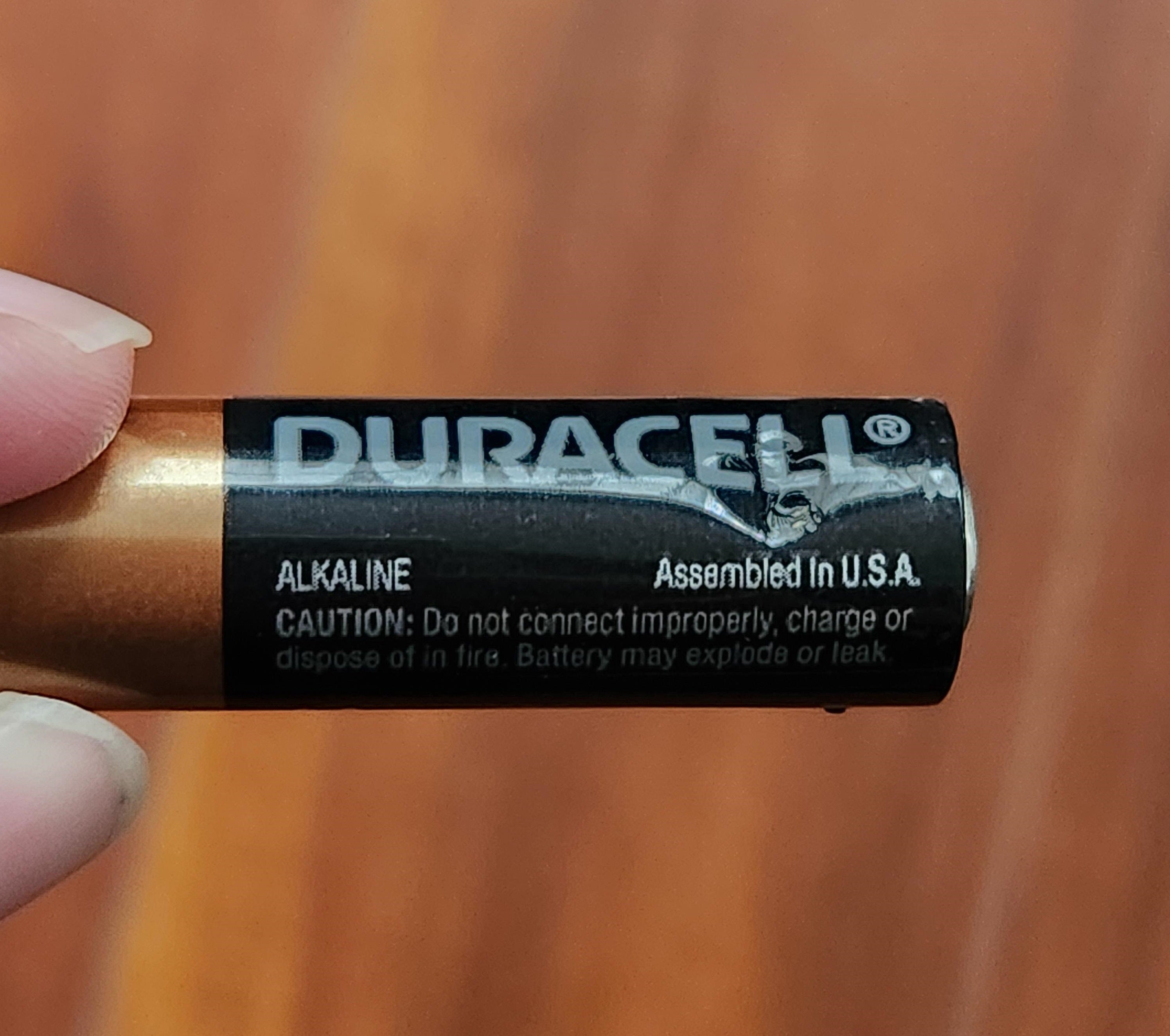 image of damaged AA battery